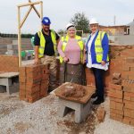 councillor-joanne-powell-beckett-and-site-manager-saul-cliff-andAngela-ward-from-donna-louise-trust-at-thenew-affordable-homes-building-site